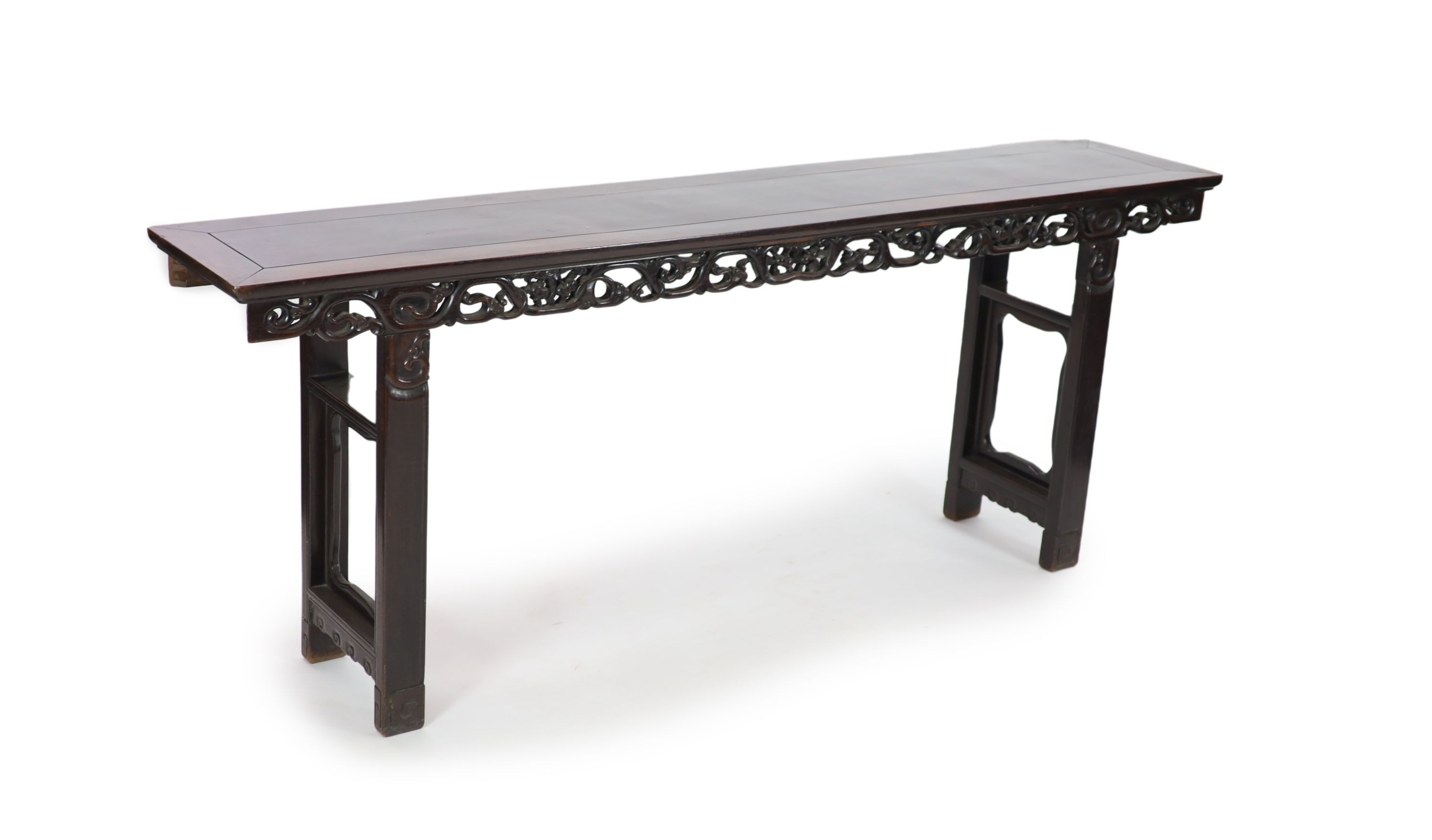 A large Chinese hongmu altar table, 19th century H 110cm. W 281cm. D 51.5cm.